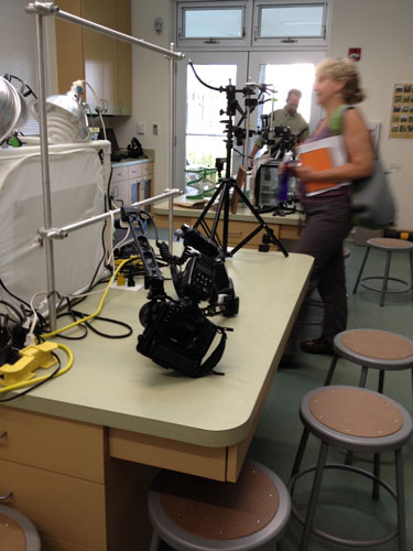 John Abbott with a selection of studio photography equipment